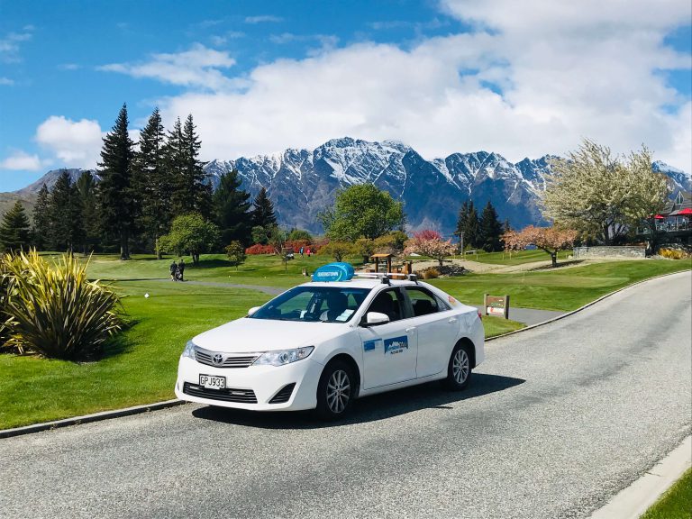 Queenstown Taxis hybrid taxi near the lake