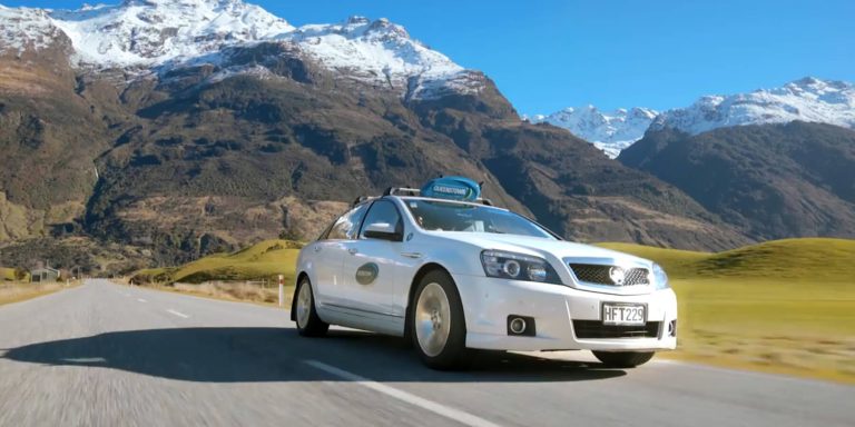 Queenstown Taxis car on an alpine road